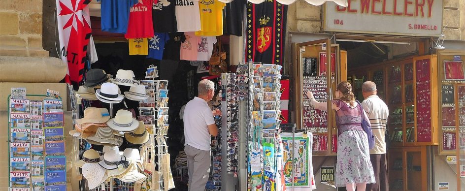Tourist shop in Malta, showcasing 'Malta Travel Guide' books